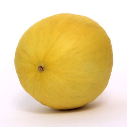 Close-up of lemon against white background