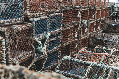 Close-up of crab pot at harbor