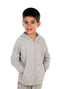 Portrait of a smiling boy against white background