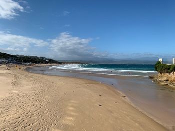 Scenic view of beach against sky