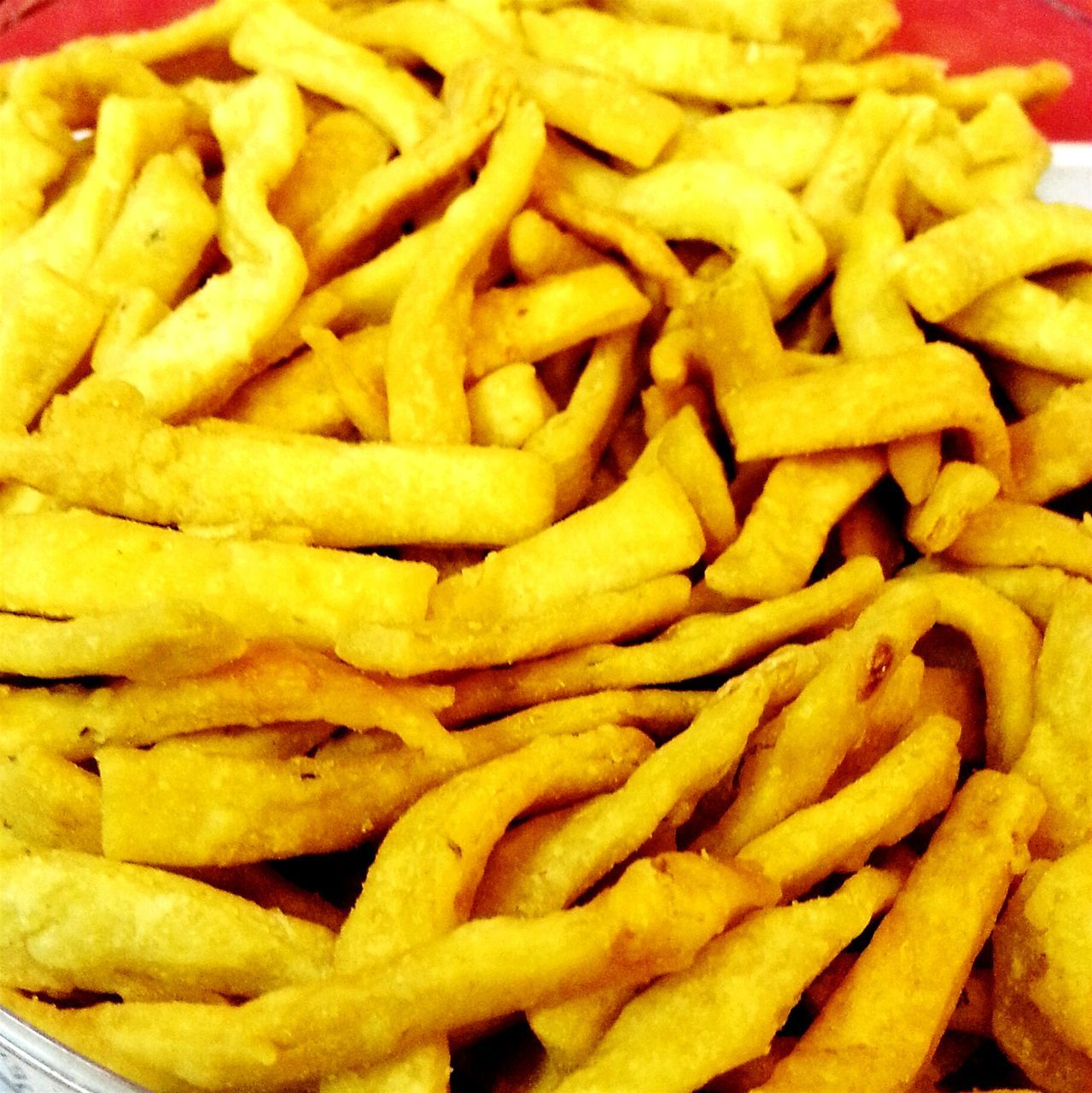 food, food and drink, freshness, indoors, ready-to-eat, unhealthy eating, still life, close-up, indulgence, full frame, french fries, snack, pasta, backgrounds, yellow, cheese, prepared potato, temptation, high angle view