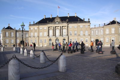 Group of people in front of building