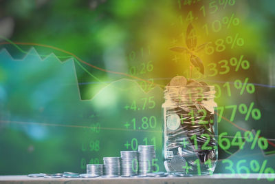 Close-up of text on glass against blurred background