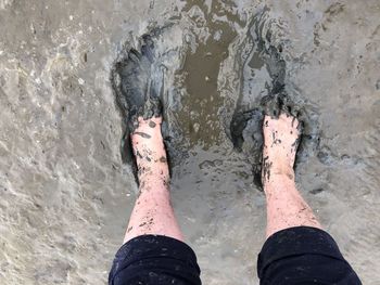 Low section of people standing in water