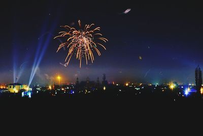 Firework display at night