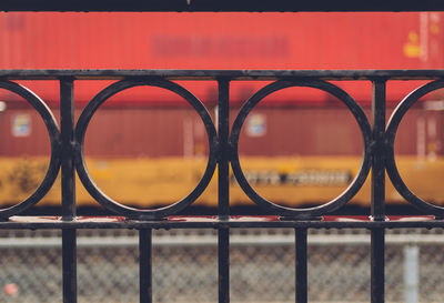 Close-up of railing against sky