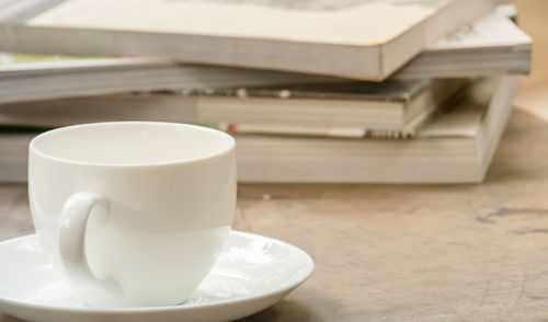 Close-up of coffee cup on table