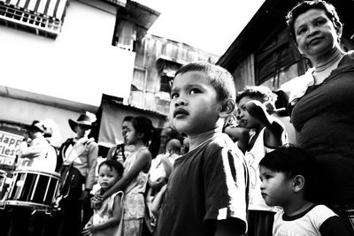 Low angle view of children on building