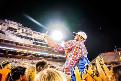 Panoramic view of crowd at night