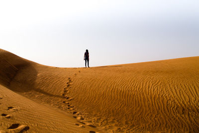 Scenic view of desert against sky