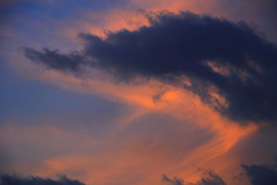 Low angle view of dramatic sky during sunset