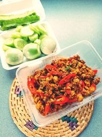 High angle view of chopped vegetables in basket on table