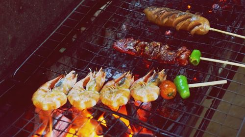 Close-up of meat on barbecue grill