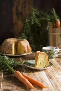 Sugar glazed carrot cake, homemade baked goods, rustic still life, national carrot cake day, cup 