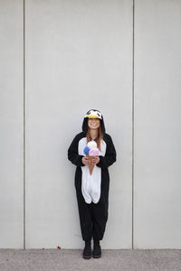 Woman in costume standing outdoors