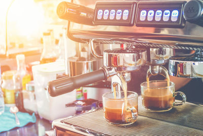 Close-up of coffee maker in cafe