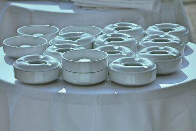 Ceramic ashtrays on table