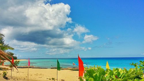 Scenic view of sea against blue sky