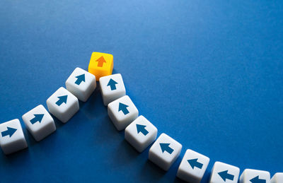 Close-up of toy blocks on blue background