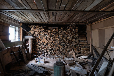 Stack of logs in abandoned room
