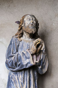 Close-up of statue against wall