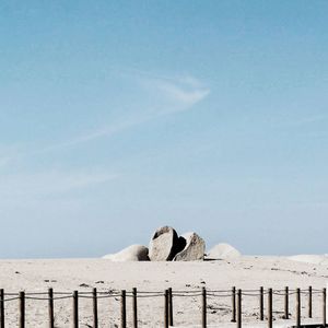 Scenic view of landscape against blue sky