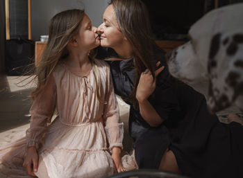 Mother and daughter at home