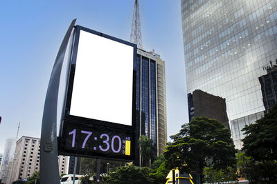 Billboard blank mock up in the city of sao paulo. use this photo day mockup for your outdoor design.