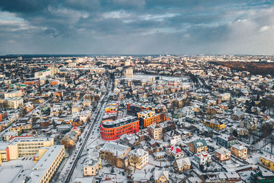 Aerial view of cityscape against sky