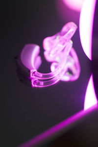 Close-up of illuminated light bulb