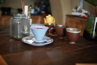 Close-up of coffee cup on table
