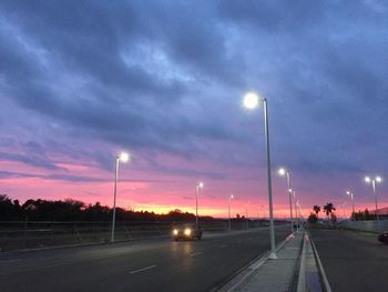 Road against sky at sunset