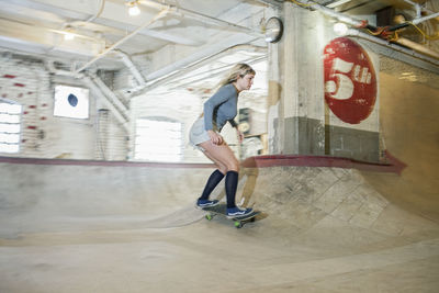 Young woman skateboarding