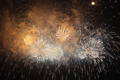 Firework display at night