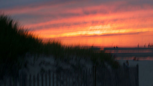 Scenic view of dramatic sky during sunset