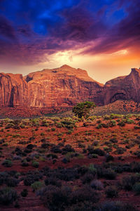 View of rock formations against cloudy sky