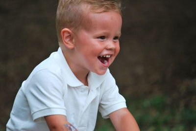 Portrait of cute boy looking away