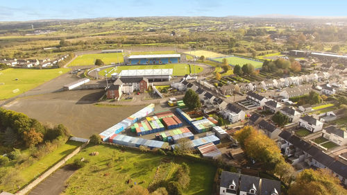 High angle view of road amidst buildings against sky
