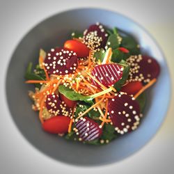 High angle view of strawberry in plate on table