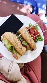 Close-up of hand holding food