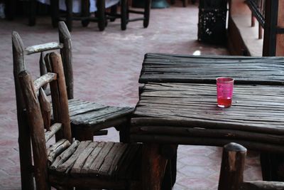 Side view of empty chairs and table