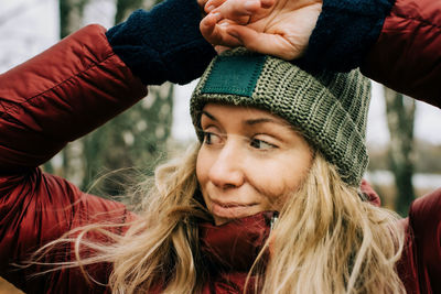 Portrait of smiling woman with hat