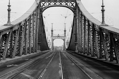 View of old railway bridge against sky