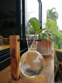 Close-up of wineglass on table at home