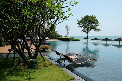 Lounge chairs at infinity pool