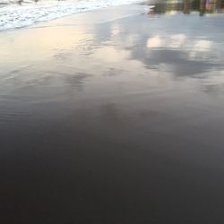 Wet sand on beach