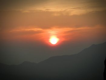 Scenic view of mountains against sky during sunset