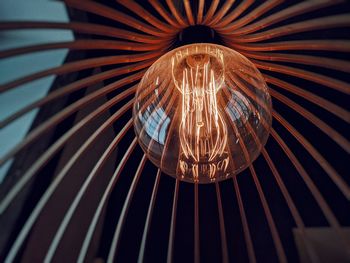 Low angle view of illuminated chandelier