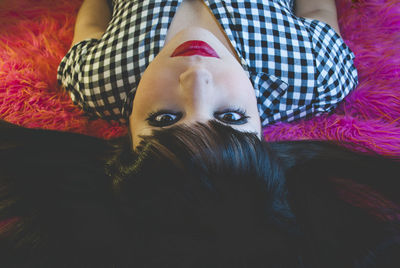 Close-up portrait of woman relaxing at home