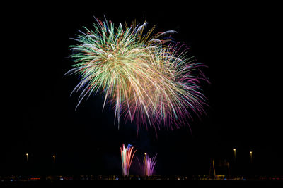 Colorful firework display in sky at night
